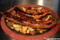 Grilled Beer Brats with Caramelized Onions