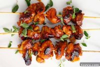 Stovetop Sambal Chicken Skewers Served on Fresh Greens