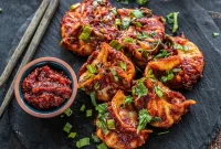 Schezwan Paneer Momos Recipe: Spicy Indo-Chinese Dumplings