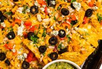 Loaded Buffalo Chicken Nachos with Creamy Ranch Drizzle