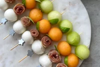 Prosciutto-Wrapped Melon Skewers with Balsamic Glaze