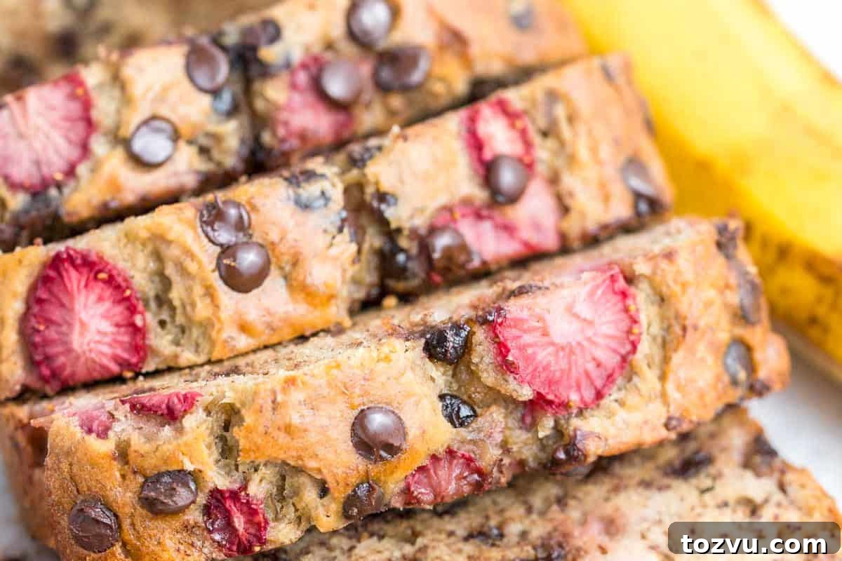 Strawberry Banana Bread Recipe: Moist Loaf with Fresh Fruit 6 sliced strawberry banana bread with chocolate chips.