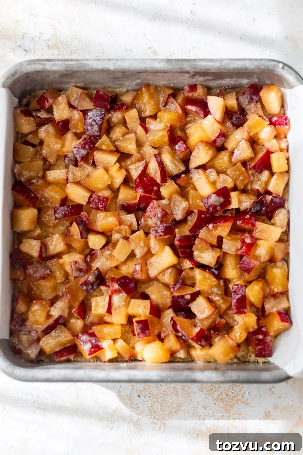 the plum filling for plum bars in a baking dish.