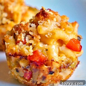 Green Chili Chicken Macaroni and Cheese Muffins 11 A close up of small mac and cheese bites
