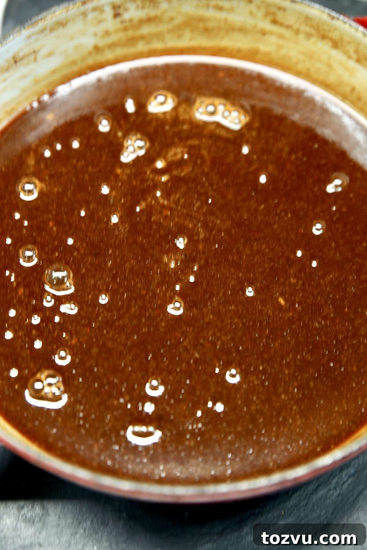 Pan of blackberry bbq sauce.