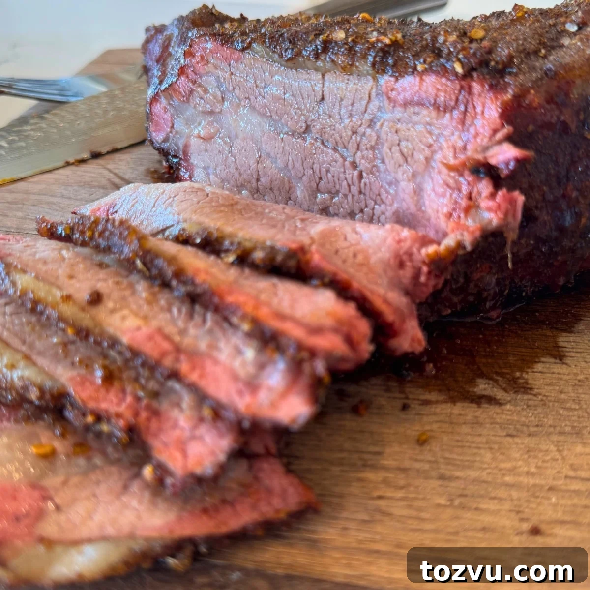 Smoked Tri-Tip Roast: Juicy, Tender BBQ Recipe 2 smoked tri tip sliced on cutting board