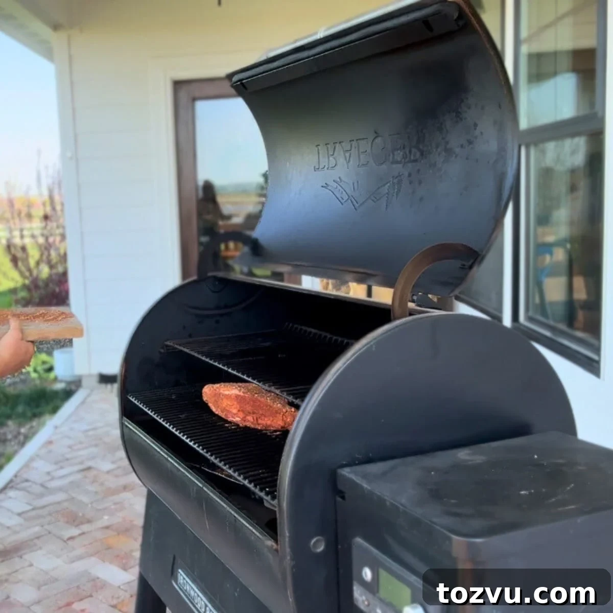 Smoked Tri-Tip Roast: Juicy, Tender BBQ Recipe 4 putting seasoned tri tip on preheated smoker grill