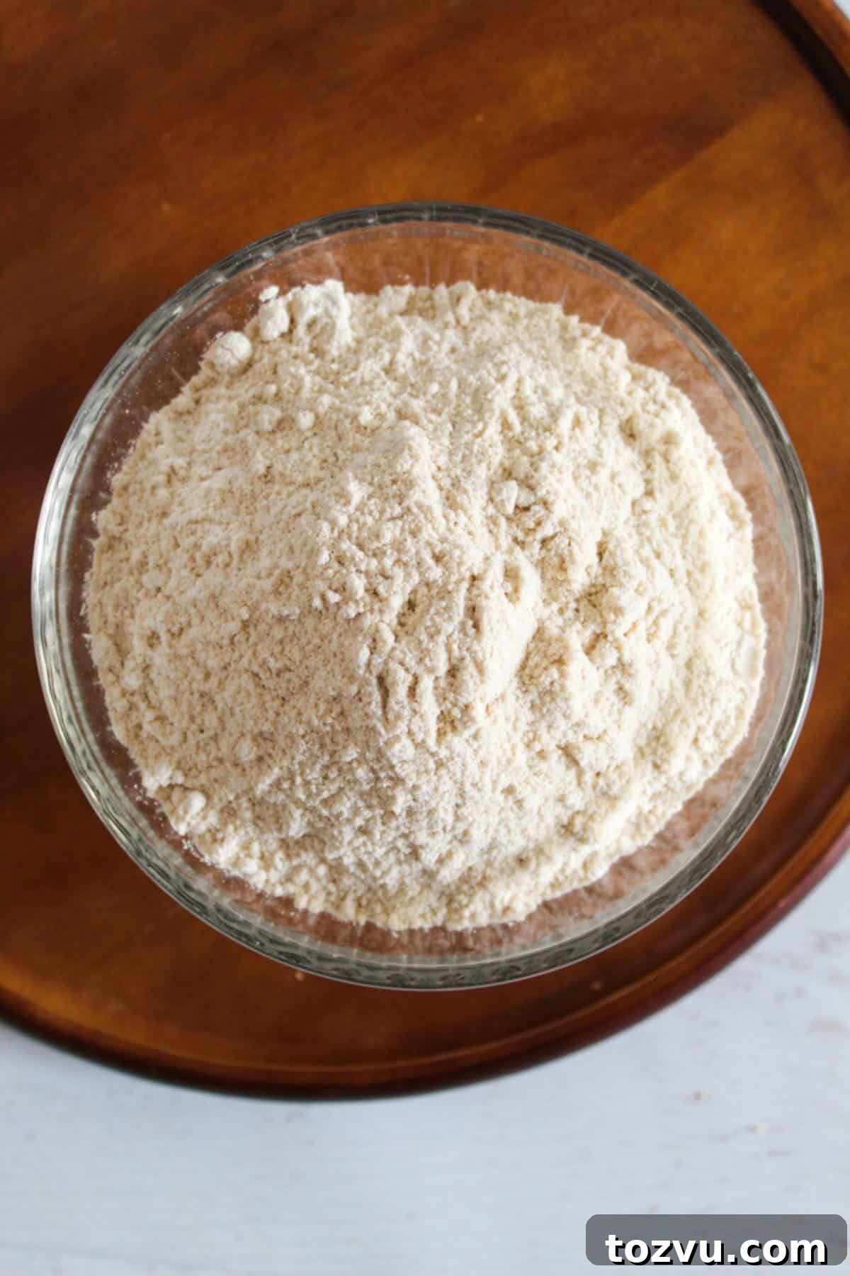 4 Teff Flour Substitutes That Match Texture and Nutrition 7 overhead of sorghum flour in a bowl.