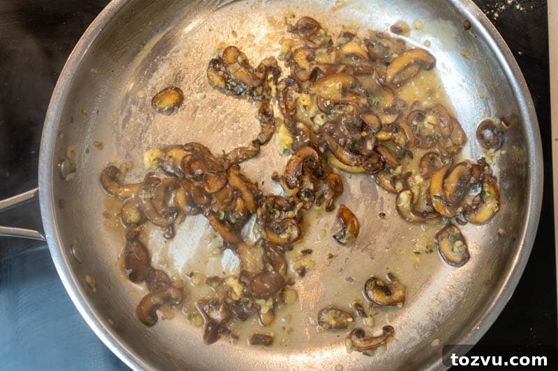 Velvety Mushroom Sauce Without Cream — Dairy-Free Recipe 6 Pouring over the wine