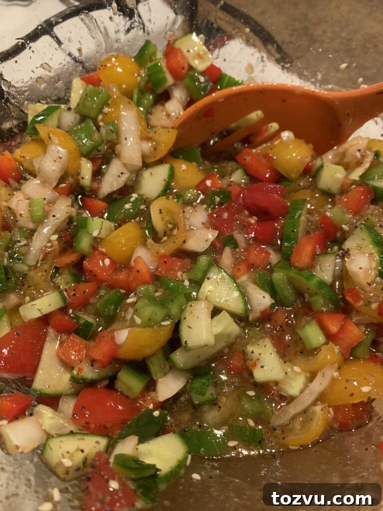 Summer Linguine Salad with Cherry Tomatoes and Basil 6 Chopped up veggies soaking in dressing