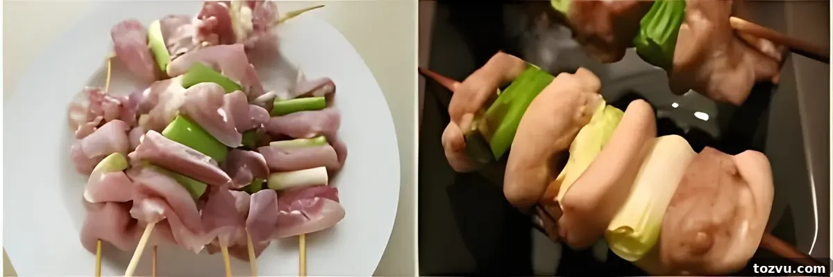 Yakitori: Authentic Japanese Grilled Chicken Skewers Recipe 5 Raw chicken pieces and spring onions threaded onto bamboo skewers before cooking.