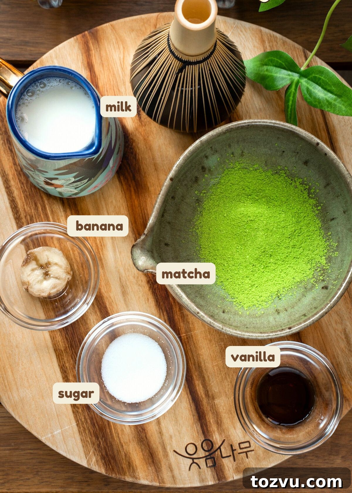 Creamy Banana Matcha Latte Recipe 3 banana matcha latte ingredients: matcha powder, banana, milk, sugar, and vanilla extract