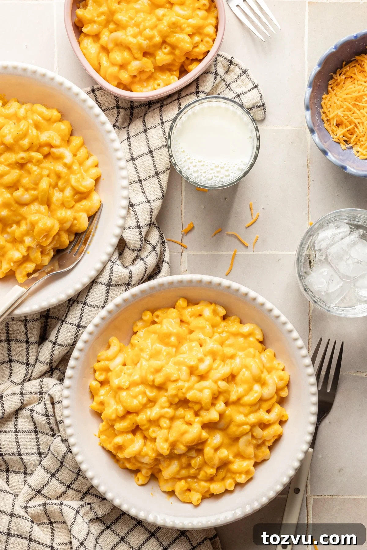 Creamy Hidden Vegetable Mac and Cheese Recipe 11 Hidden veggie Mac and cheese in white bowls.