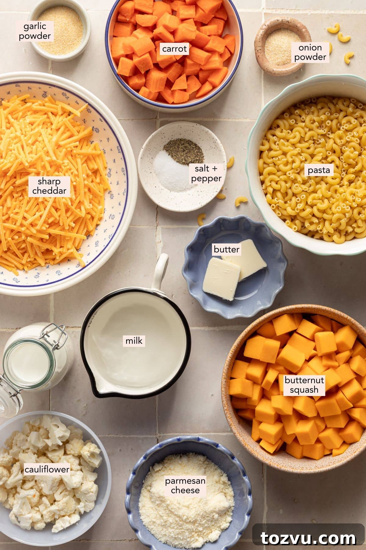 Creamy Hidden Vegetable Mac and Cheese Recipe 4 Ingredients for hidden veggie Mac and cheese on a countertop with labels.