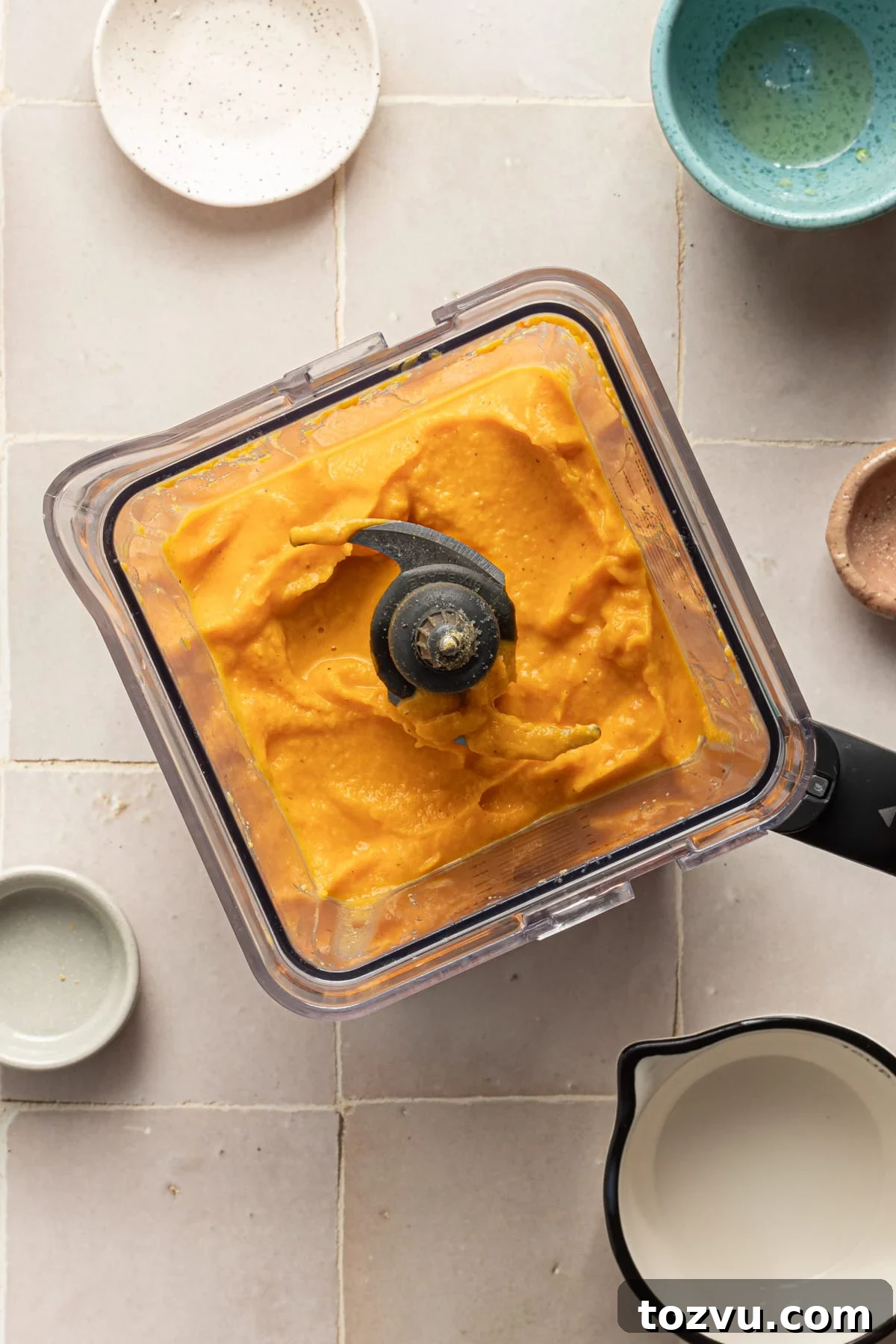 Creamy Hidden Vegetable Mac and Cheese Recipe 8 Blended veggies in a blender for hidden veggie Mac and cheese.