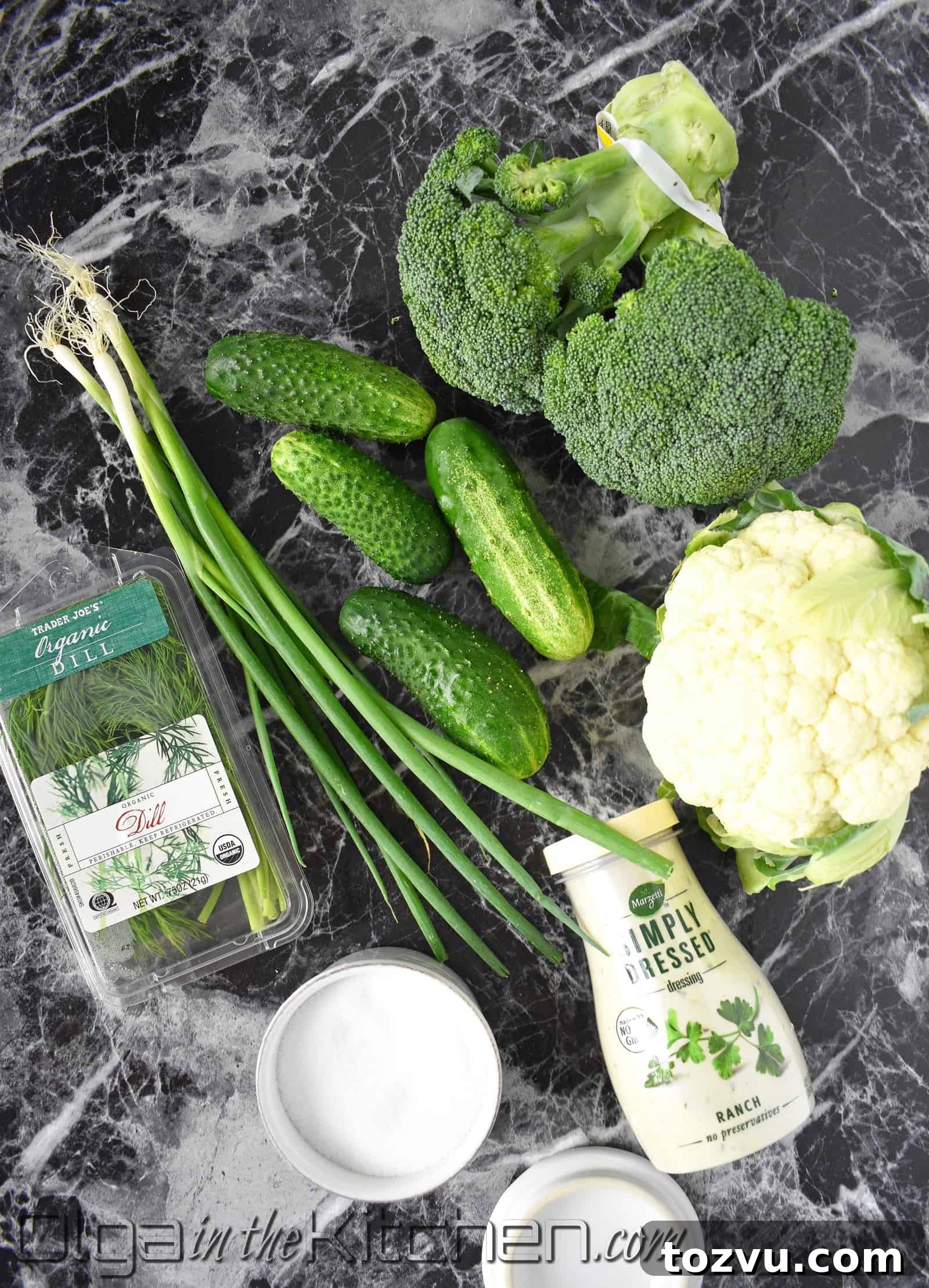 Crunchy Broccoli, Cauliflower & Cucumber Salad with Zesty Lemon 4 Fresh chopped vegetables ready for mixing.