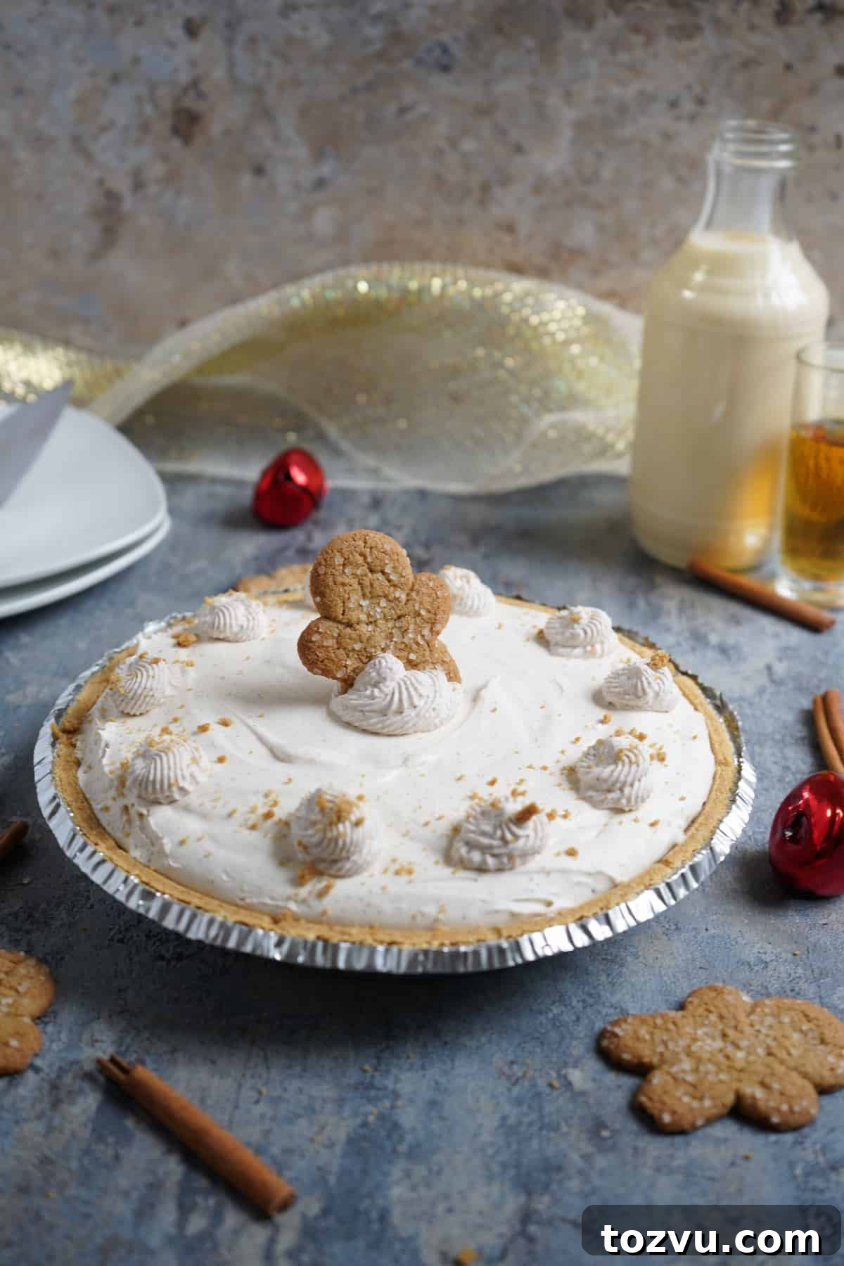 No-Bake Eggnog Cheesecake with a Boozy Twist 2 Eggnog Cheesecake with serving plates
