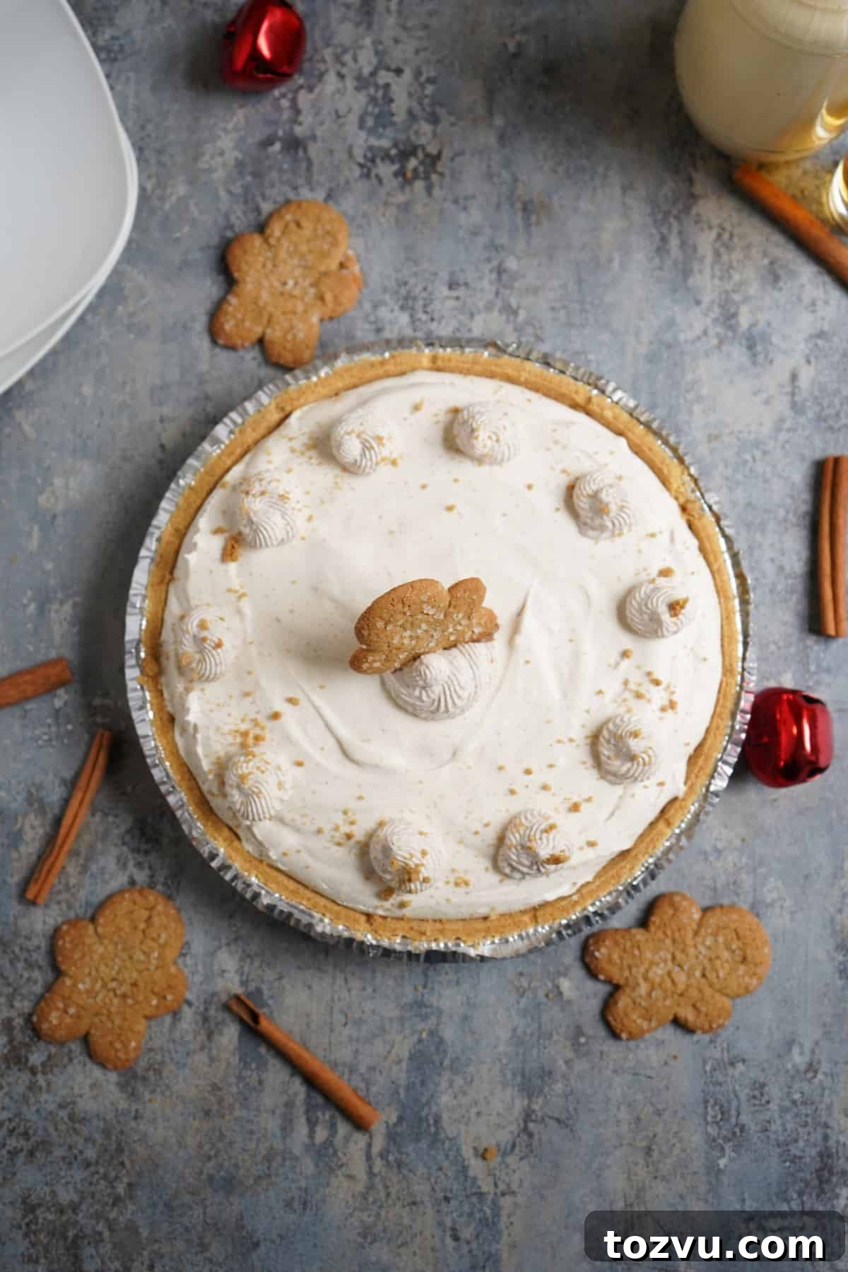 No-Bake Eggnog Cheesecake with a Boozy Twist 7 Eggnog Cheesecake with graham cracker crust