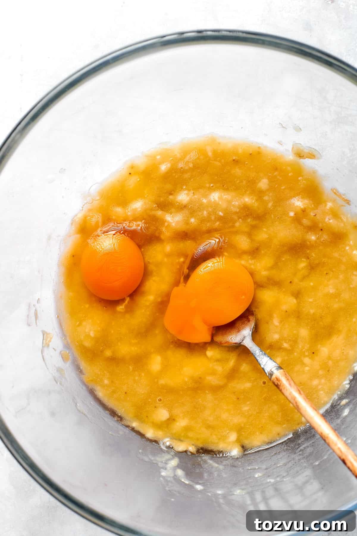 Eggs are whisked into the banana.