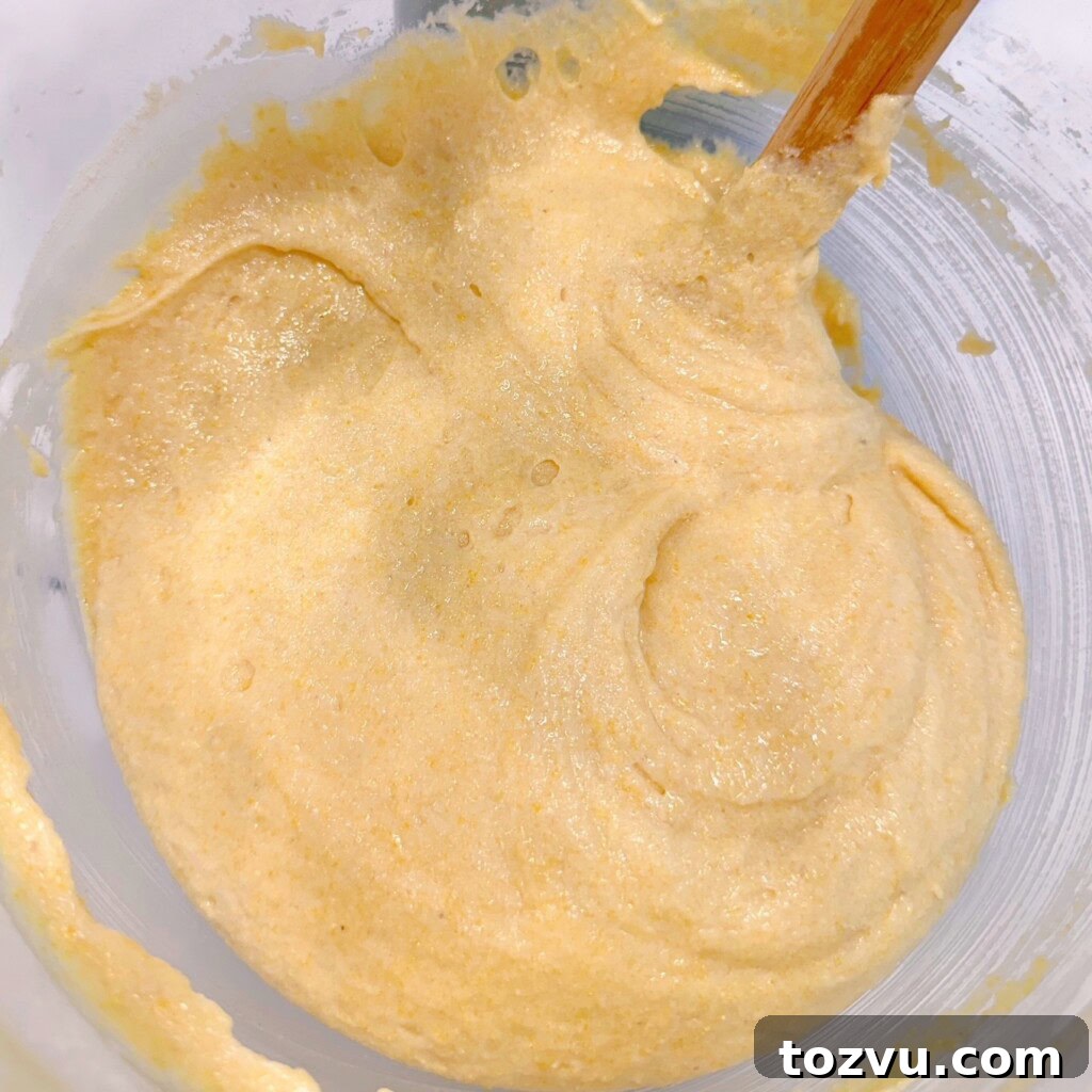 Buttery Sweet Cornbread with Golden Crust 6 Combine wet and dry ingredients in a mixing bowl.