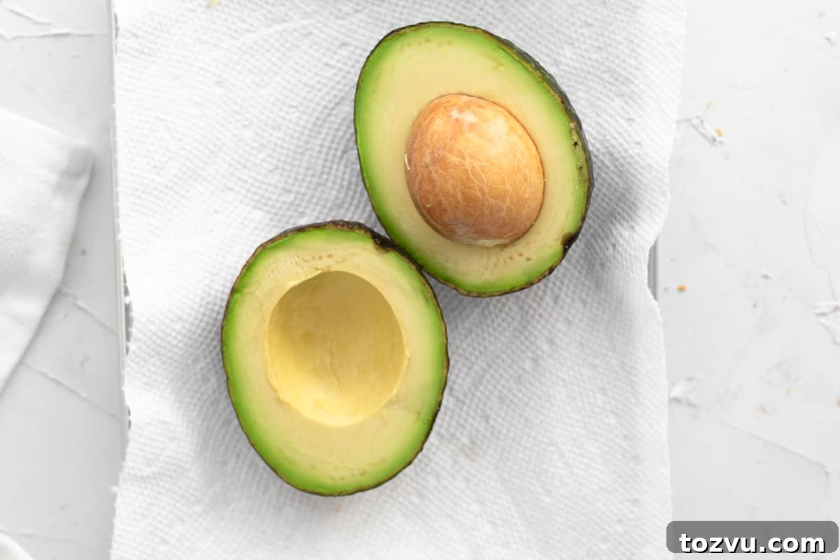 How to Make Avocado Puree for Baby Food 3 avocado cut in half