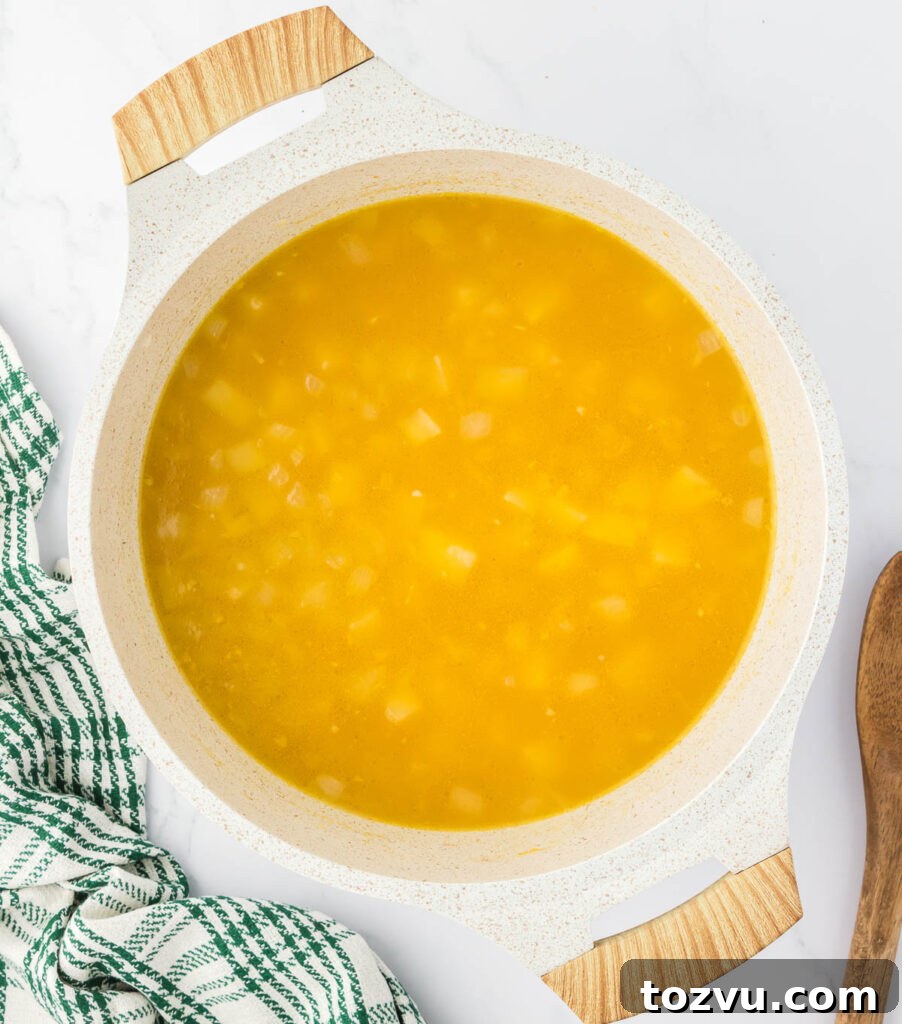 potatoes simmering in vegetable broth