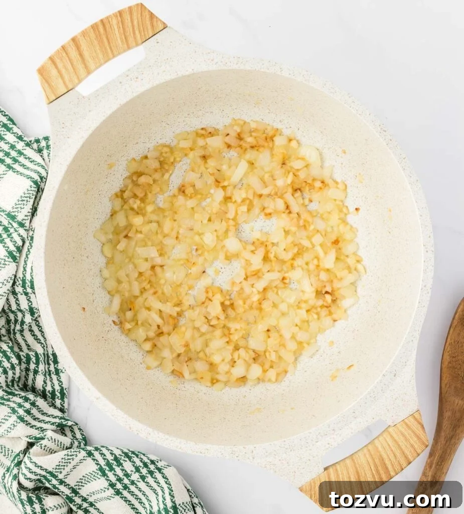 sauteed garlic and onion in a sauce pan