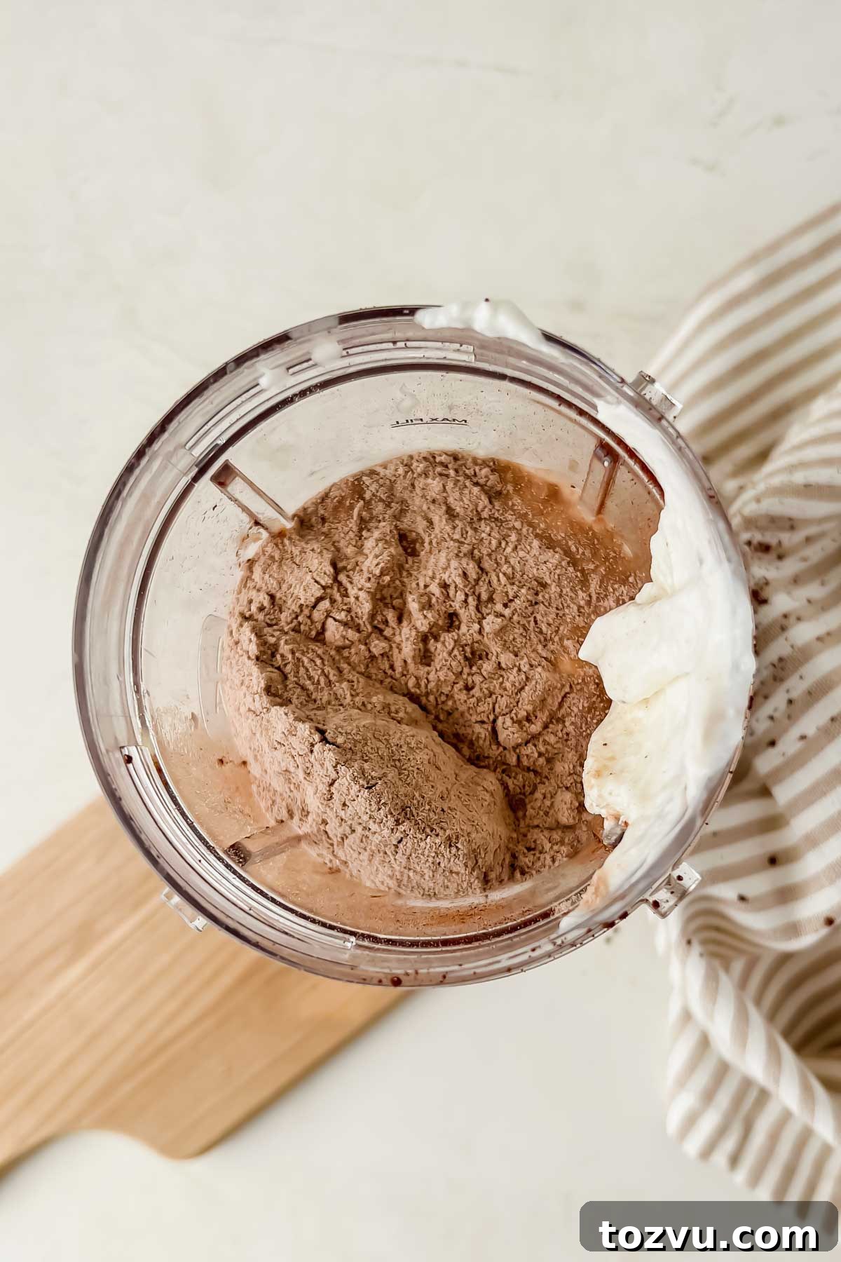Mocha Madness Smoothie Recipe: Tropical Smoothie Copycat 4 protein powder and yogurt in blender bottle.