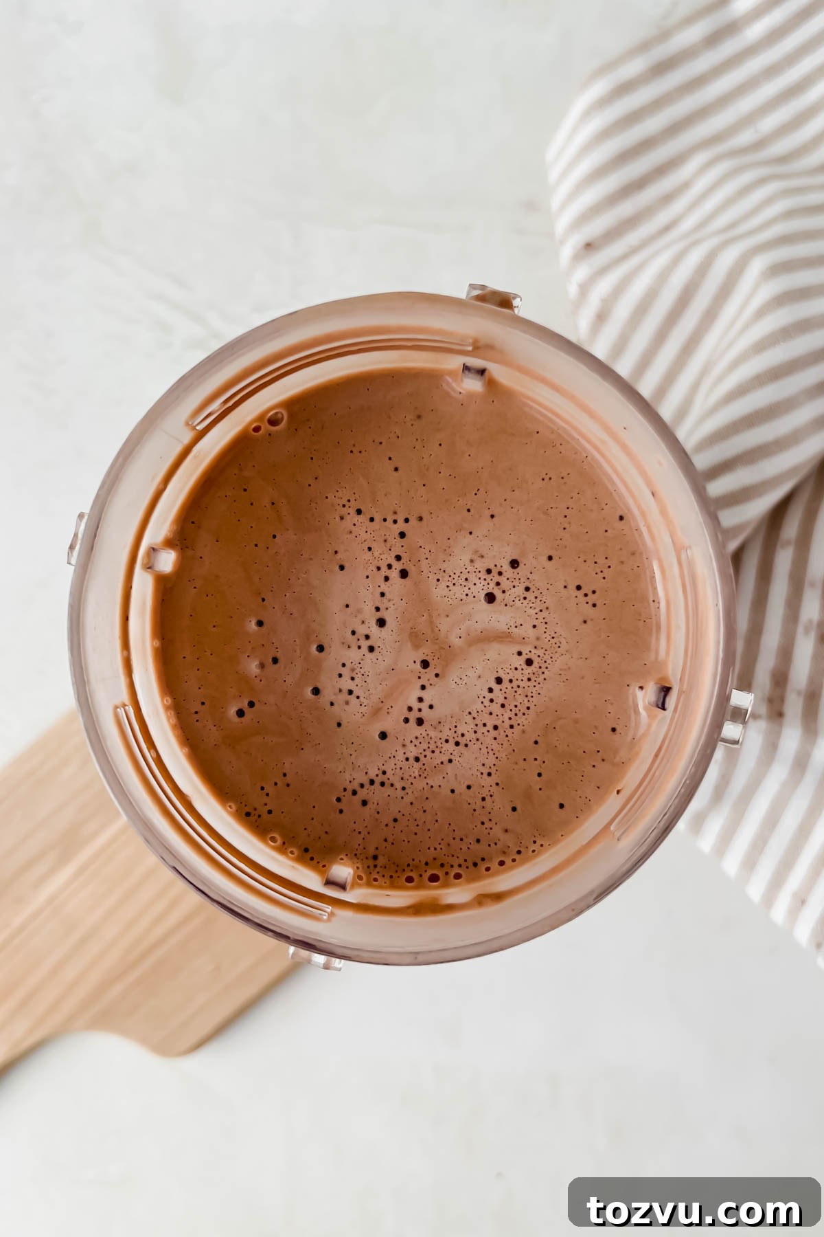 Mocha Madness Smoothie Recipe: Tropical Smoothie Copycat 6 homemade tropical smoothie mocha madness smoothie blended in blender cup.