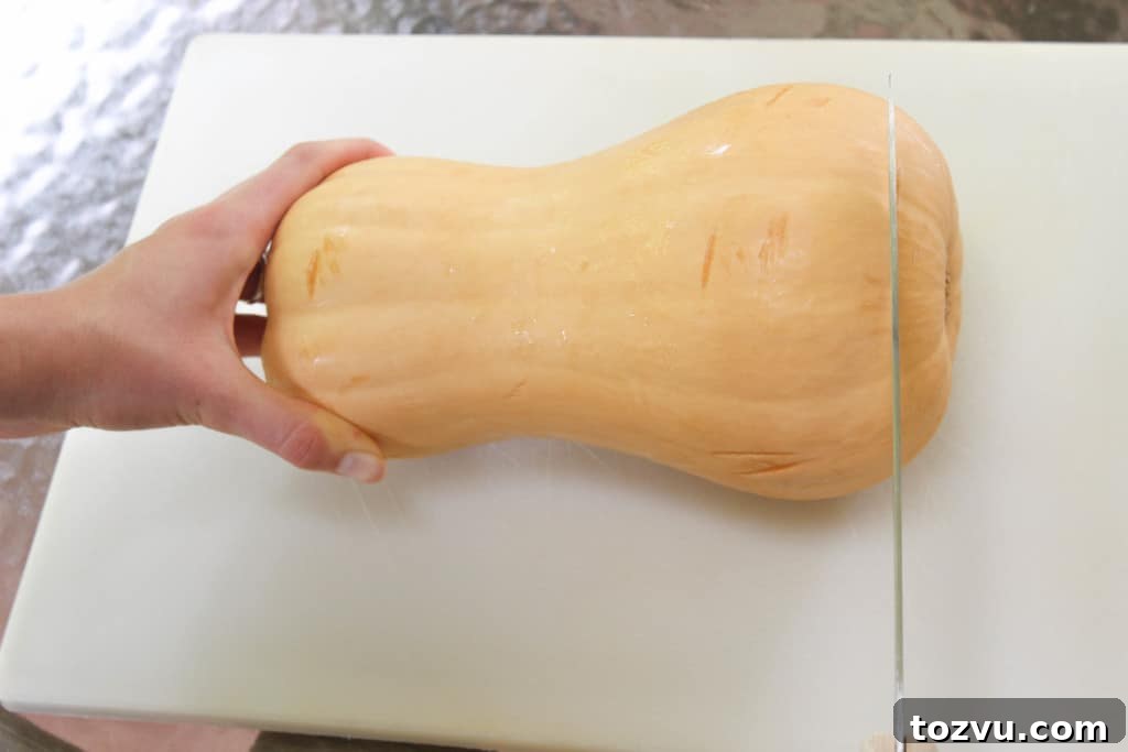 Trim the ends of the squash to create a stable base