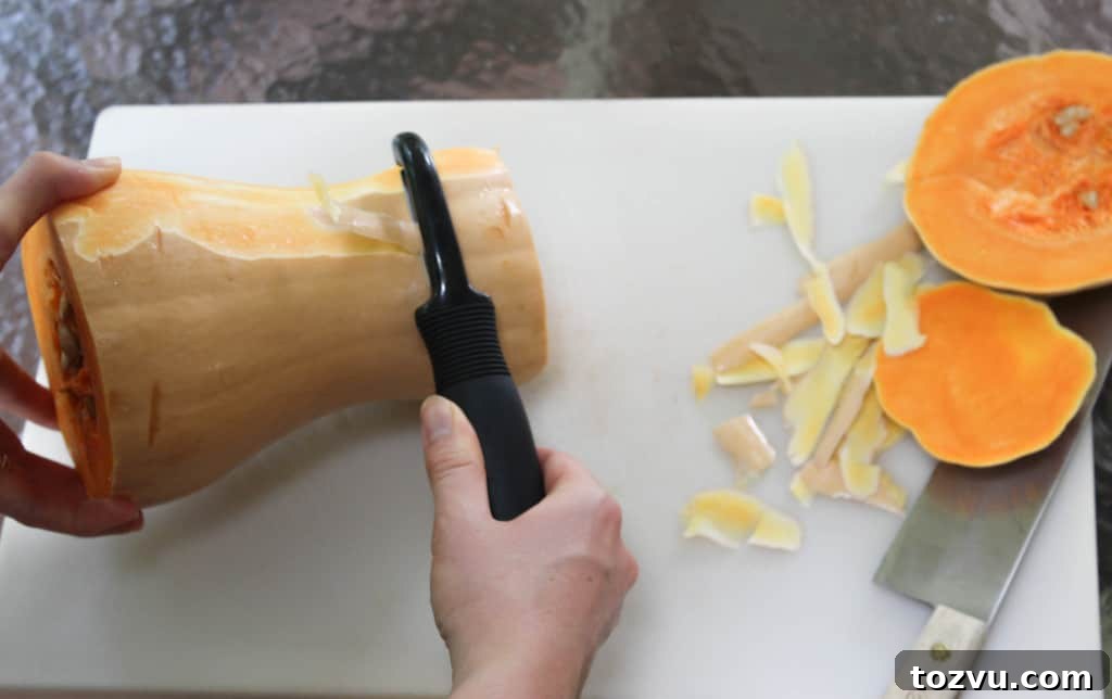 Peel the squash with a vegetable peeler