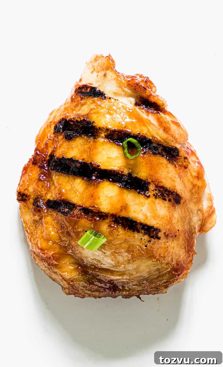 How to Grill Chicken Thighs for Juicy, Crispy Results 6 a single grilled chicken breast