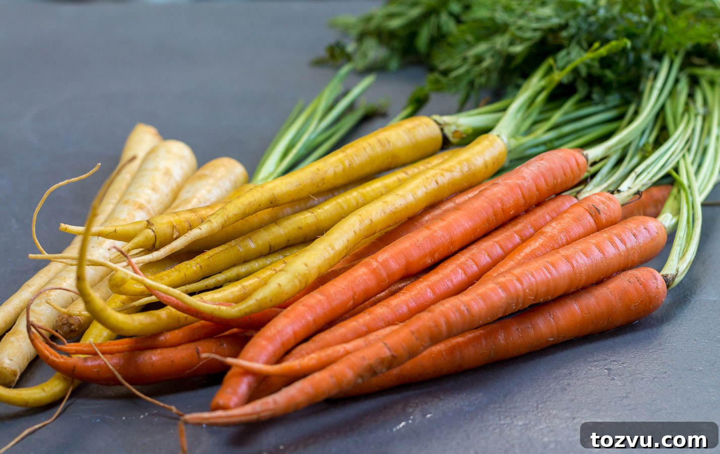 Organic orange, yellow and white carrots