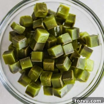 Matcha Ice Cubes for Iced Lattes, Smoothies and Cold Brew 9 Small matcha ice cubes.