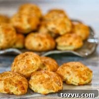 a plate of bacon cheese puffs