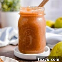 Quick Instant Pot Pear Butter Recipe 10 A straight on shot of the Instant Pot Pear Butter in a jar.