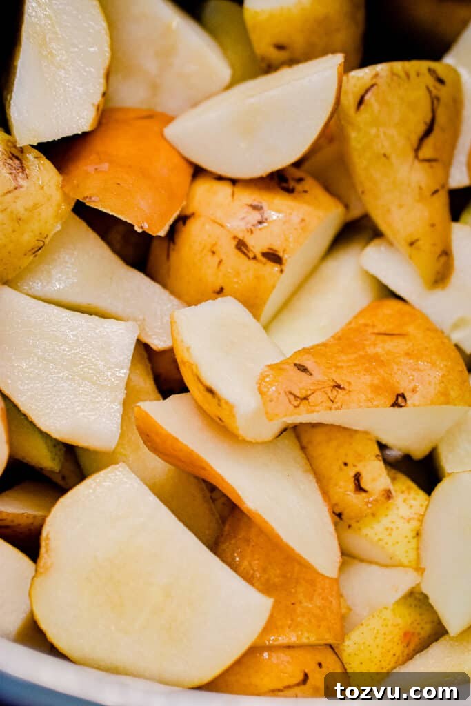Quick Instant Pot Pear Butter Recipe 5 The chunks of pears are in the instant pot.