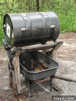 37 Creative DIY Compost Bin Ideas 27 Compost Tumbler In A Cradle DIY